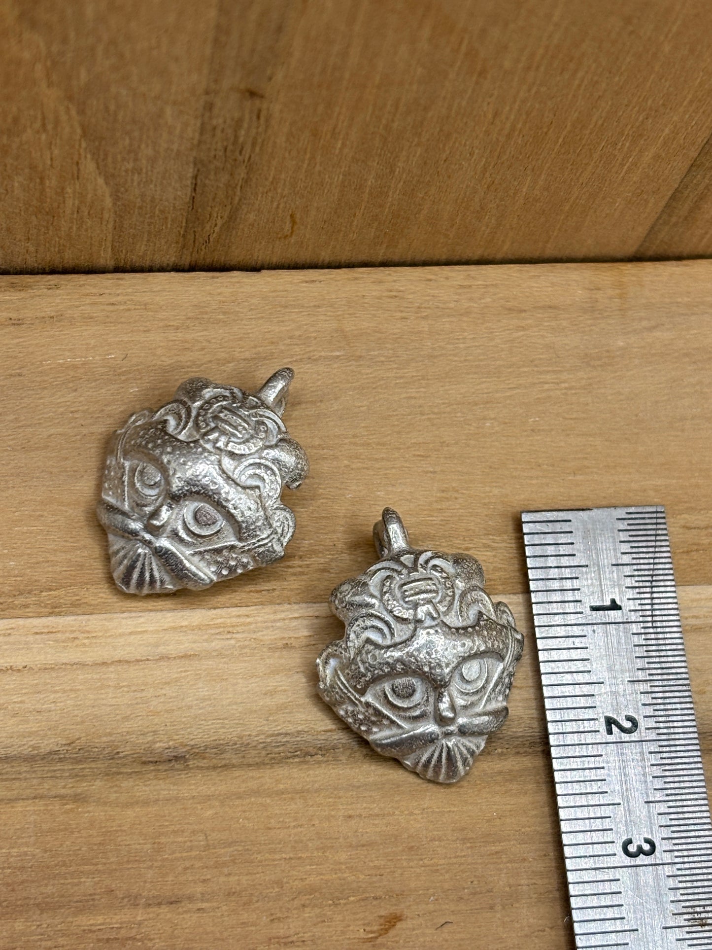 historical Loki mask pendant, Mammen style